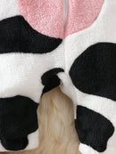Macacão com capuz e design felpudo de vaca para bebê menina