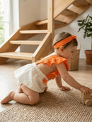 Local
Romper Bebê Menina - Laranja e Creme